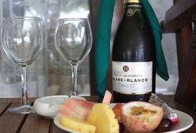 glass bottle of alcohol with fruit