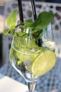 Lime cocktail in a glass with mint