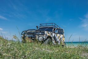 Car Offroad Jeep at coast
