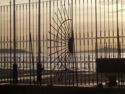 access through the fence to the sea