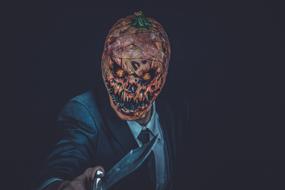 scary mask of a man with a knife