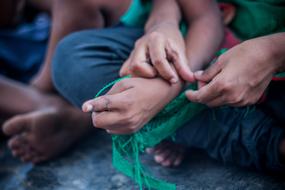 hands and green cloth