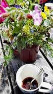 strong coffee by the flowers