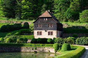 Castle Mespelbrunn and green park