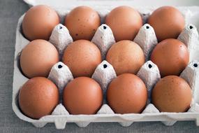 ripe orange eggs in a box