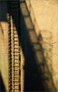 shadow of the stairs on the wall