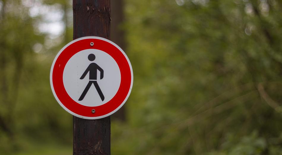warning sign on the pole