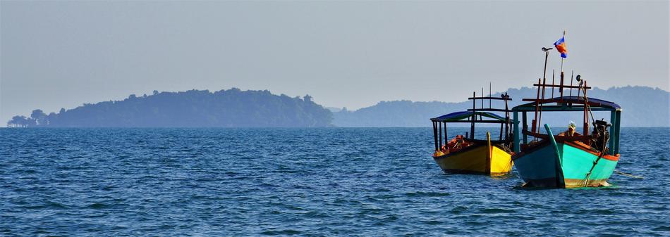 panorama picture of boats in ocean