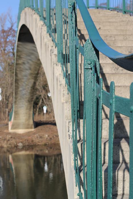 arch bridge by the river