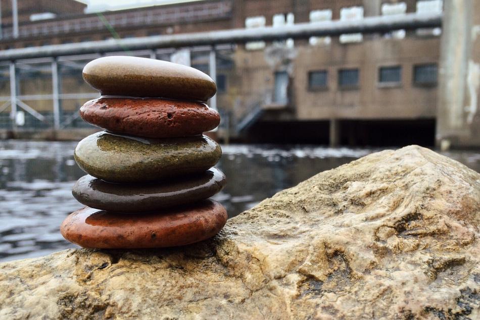stone tower on the beach by the river
