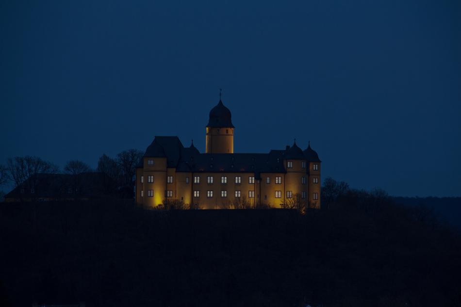 burning castle in the night