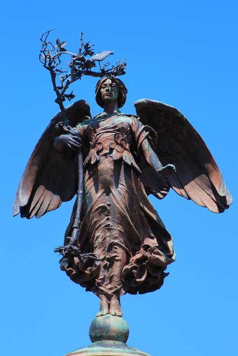 Statue of a bronze angel on the roof