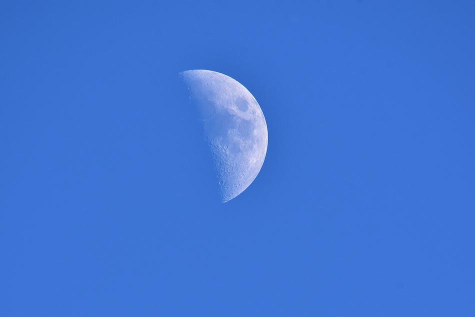beautiful white moon in a blue sky