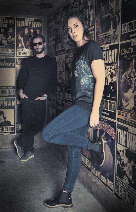 man and woman in a dark bar