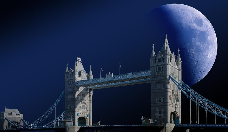 bridge with towers against the moon