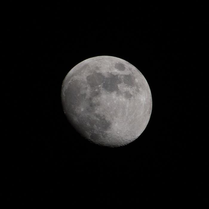 full white moon in the night sky