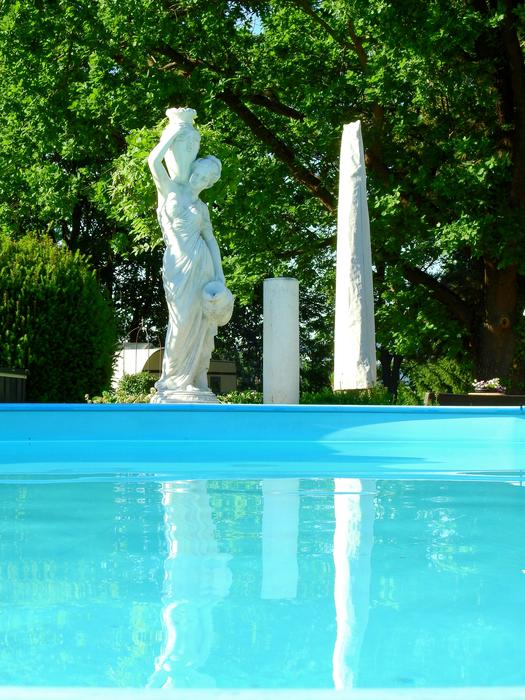 statues set up near the pool