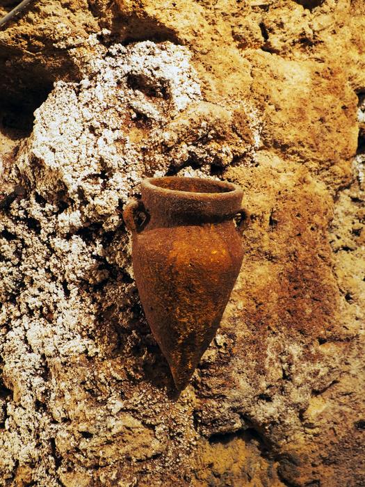 an old jug on the wall