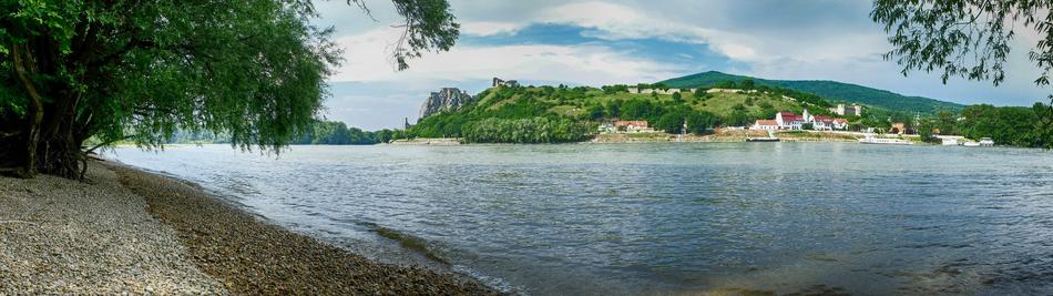 a large lake with hills