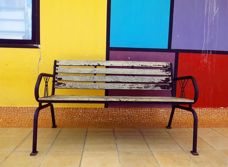 a bench with a colored background