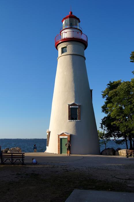 white lighthouse by the sea