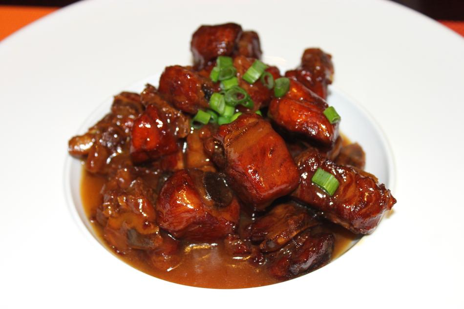 meat in sauce with herbs