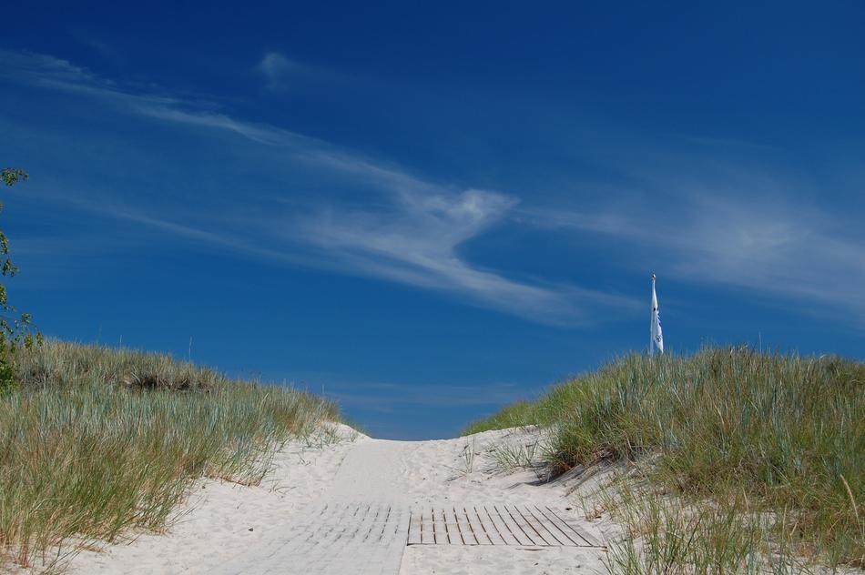 blue background on the road with sand
