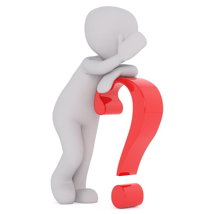 model of a white man with a red question mark