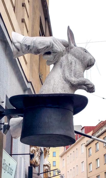rabbit in a hat on the wall