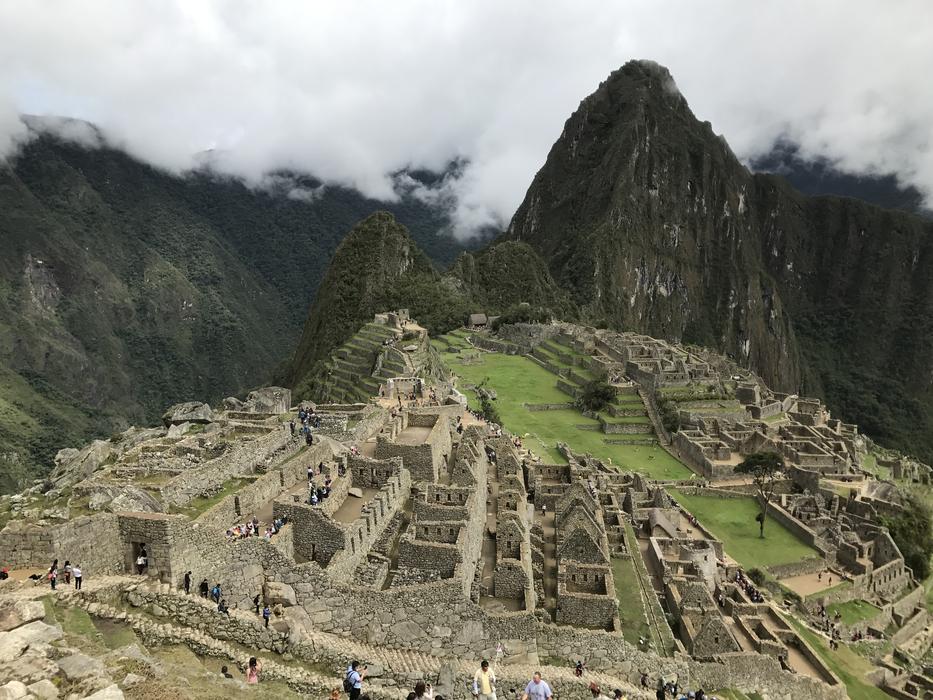 beautiful building with mountains