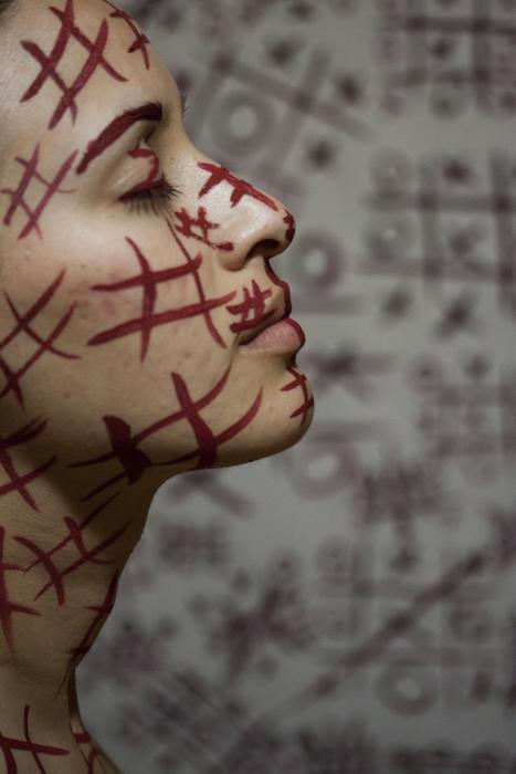 girl face outlined with red lines