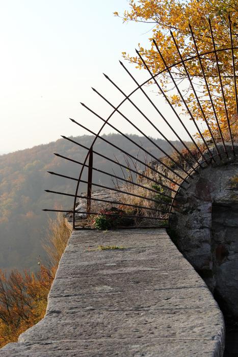metal fence on a stone fence