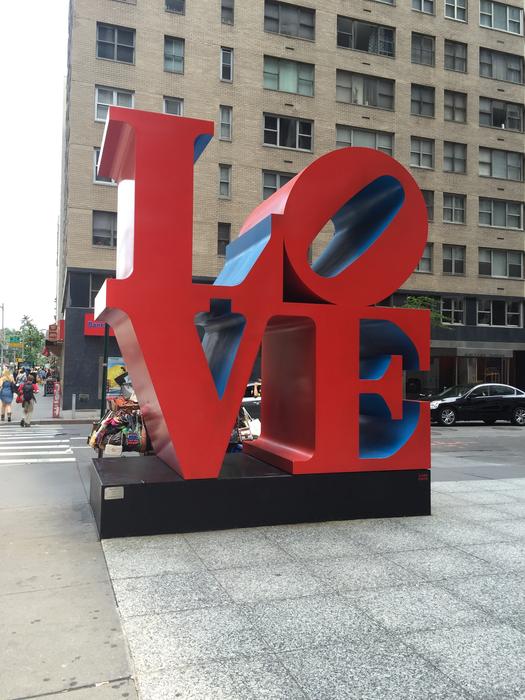 red letters sculpture on the square