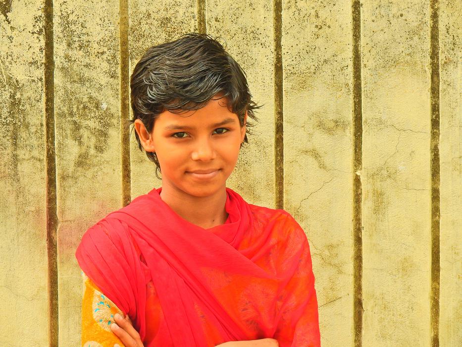 smiling girl in a red shirt