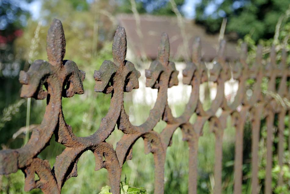 rusty patterned fence