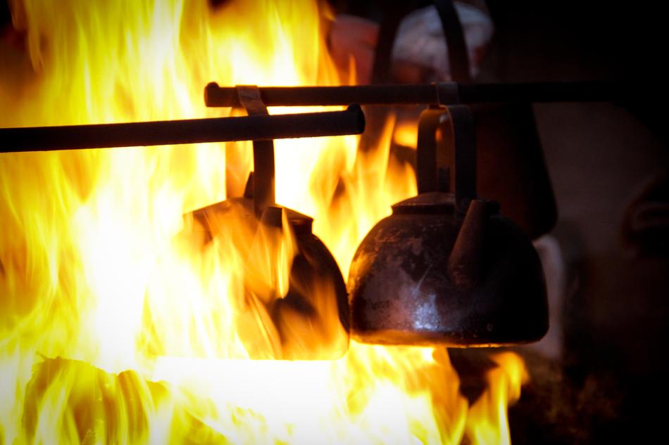 kettles on a burning fire