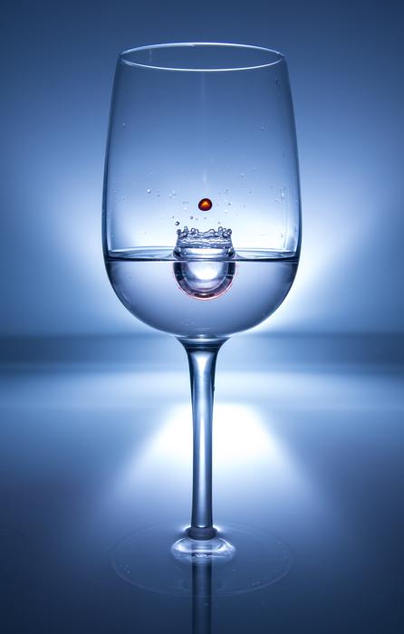 drop falling into the glass in the