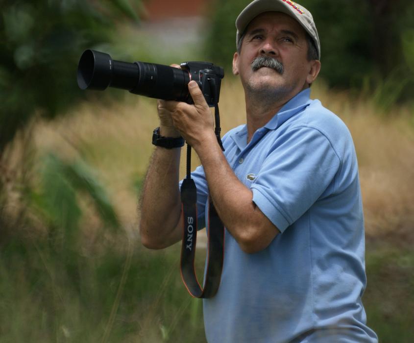 old man with a camera