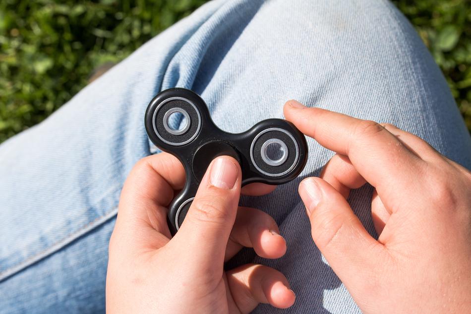 black spinner in hand
