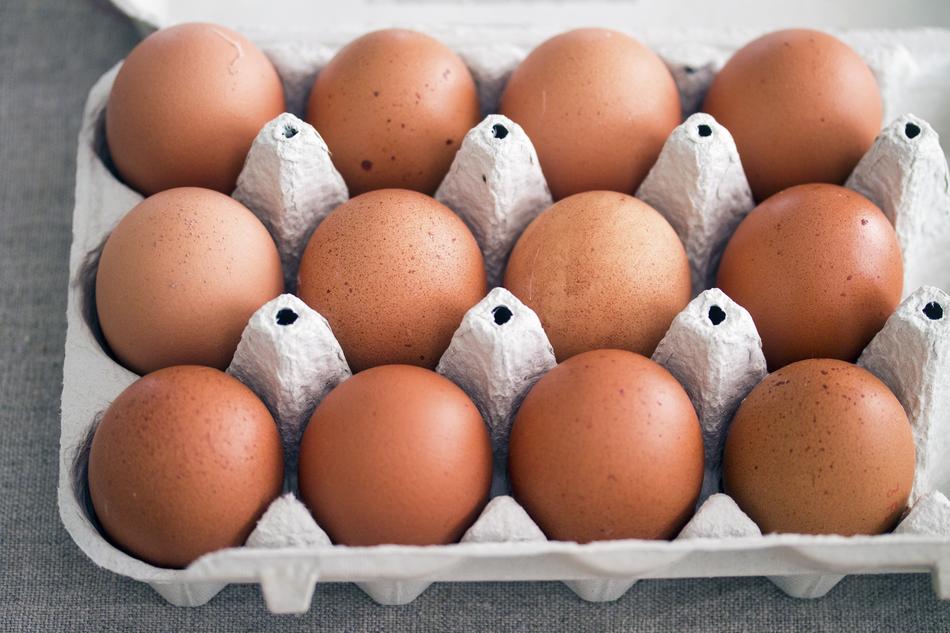 ripe orange eggs in a box
