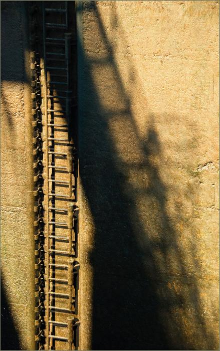 shadow of the stairs on the wall