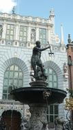 sculpture of a man on the fountain