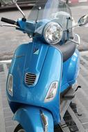 blue motorcycle on the street