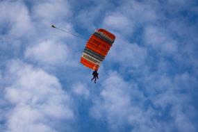 man on a parachute in the sky