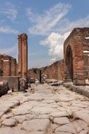 Beautiful landscape of Pompei, Italy, with buildings, under the blue sky with clouds