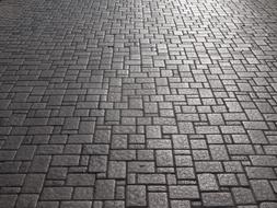 Beautiful stones of the pavement, in light