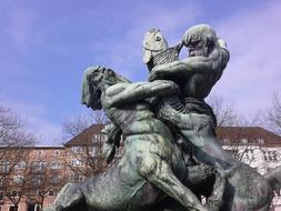 two struggling men sculpture