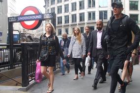 cityscape of London Tube people