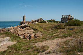 stone lighthouse by the sea