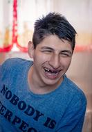 portrait of a cheerful smiling young man